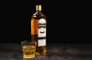 Bushmills bottle and glass